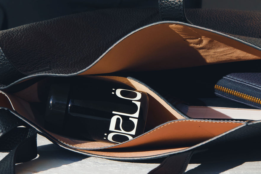 A Bottle of ORLO - taken on the go in a hand bag.