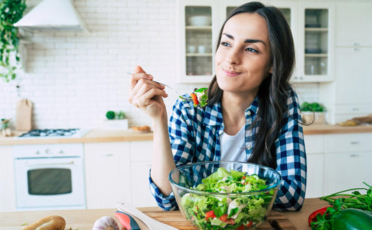woman eating vegetables